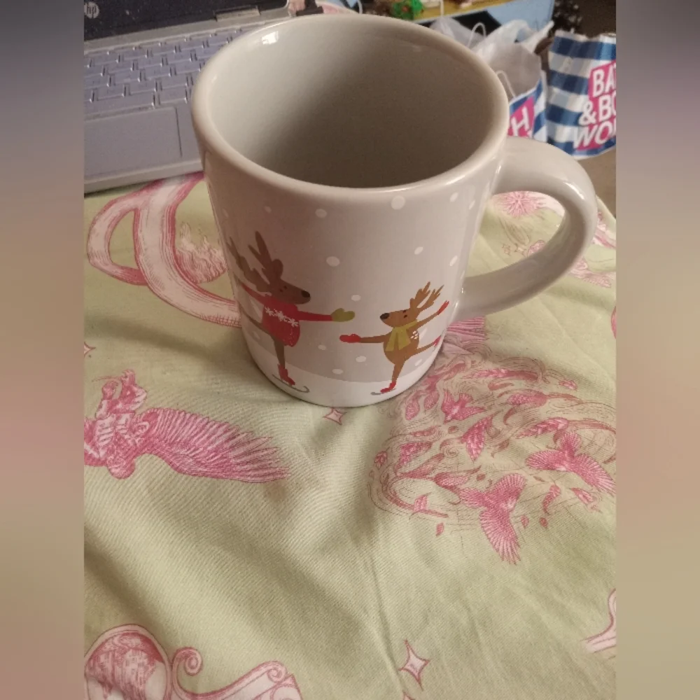 Ice Skating Reindeer Coffee Mug